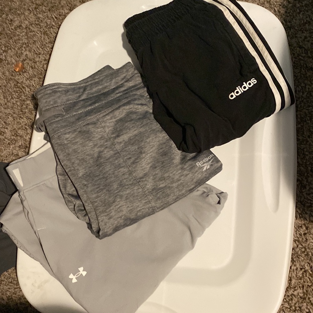 3 pairs of joggers adidas, reebok, and underarmor size M